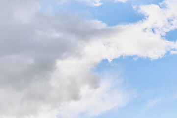 Clouds in the blue sky. Abstract background.