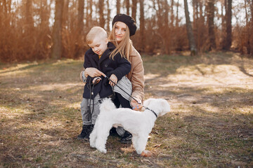 Fototapeta premium Mother with son playing in a summer park