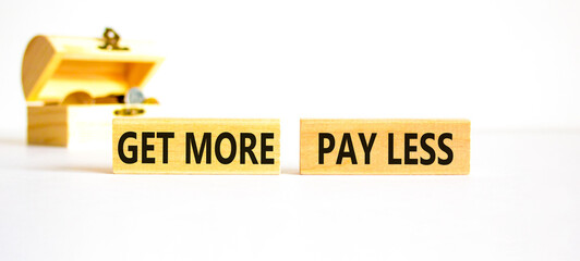 Get more pay less symbol. Concept words Get more pay less on wooden blocks on a beautiful white...