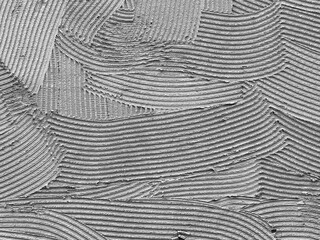 mit einem Zahnspachtel erzeugte Wandstruktur 