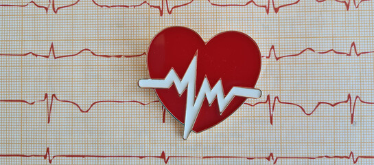 Electrocardiogram and heart and heartbeat icon closeup