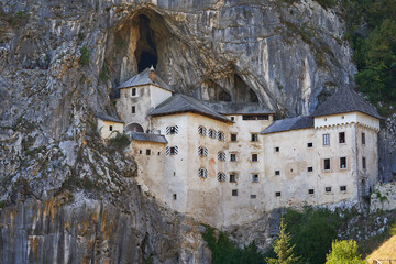 Predjama Castle, also known as Predjamski Grad, is a Renaissance castle built within a cave mouth...