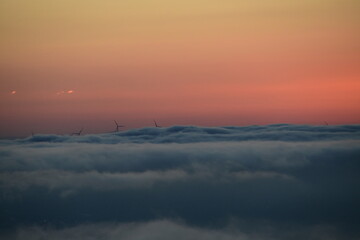 dawn clouds windmills