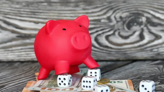Piggy bank among dollar and euro banknotes. Cryptocurrency coins are visible. Risk while saving money. Multicurrency savings..