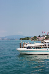Lake Garda on a sunny day. The North of Italy. A picturesque place