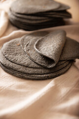 Blue Corn Tortillas. Food made with nixtamalized corn, a staple food in several American countries,...