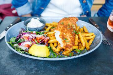 Fish and chips served at outdoor restaurant