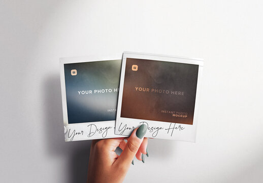 Left Hand Holding Two Instant Photos Mockup