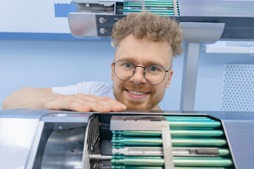 Man engineer background fragment energy fuel uranium or thorium rod element of nuclear reactor water