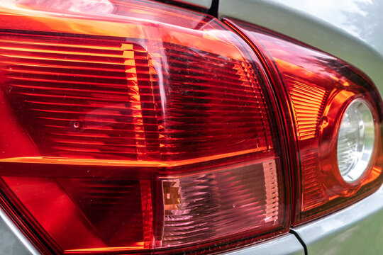 Red Car Lamp On Silver Car Body