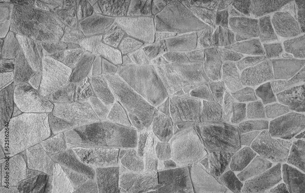 Poster front view of stone wall made of weathered stone slates. abstract high resolution full frame texture