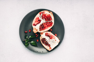 Open red garnet on a plate