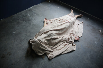 Body young woman girl dead was thief violence sexual raped and killed on floor ground at abandon...