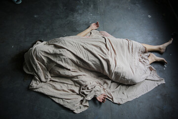 Body young woman girl dead was thief violence sexual raped and killed on floor ground at abandon...