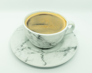 Cup of hot coffee, on white background.