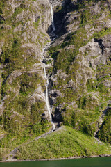 Beautiful and imposing Norwegian fjord in spring with its waterfalls