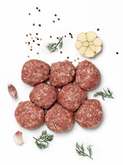 Turkey meat balls decorated with vegetables on white background. Top view.