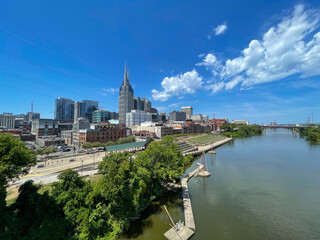 Skyline of Nashville is seen from the Shelby Street Pedestrian bridge over the Cumberland River,...