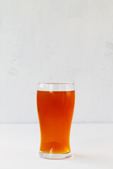 glass of beer. summer iced drinks. Glass of fresh kvass on white background with copy space. vertical
