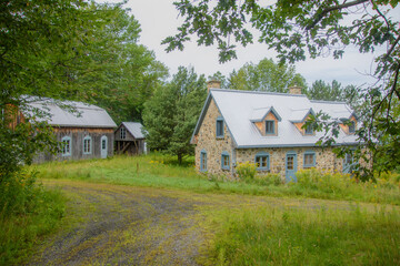 Typical architecture of a canadian house on the countryside in the province of Quebec