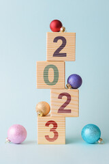 Xmas tree made of wooden cubes and Christmas decoration