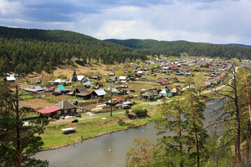 Fototapeta na wymiar Peasant Tatar village on the river bank
