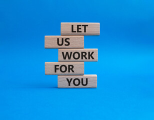 Let us work for you symbol. Wooden blocks with words Let us work for you. Beautiful blue background. Business and Let us work for you concept. Copy space.