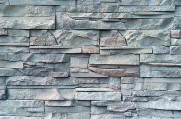 Background texture of stone facade decoration quartzite.