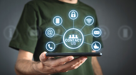 Contact us concept with a man holding smartphone. Customer support