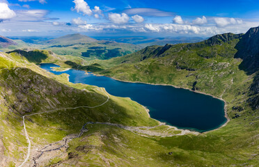 Aerial view of a beautiful mountain lake and hiking trail (Llyn Llydaw and Miners track, Snowdon)