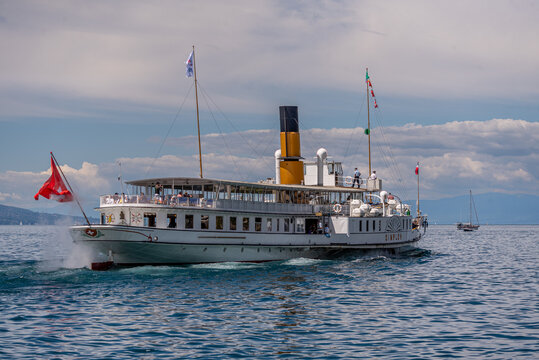 Swiss steamboat with passengers on Lake Geneva. CGN boat. Mogres, Vaud Canton, Switzerland, 