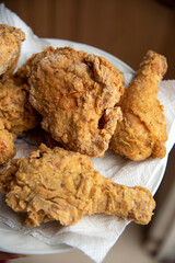 Plate with pieces of fried chicken