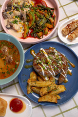 Top view of a table full of food in a cafe
