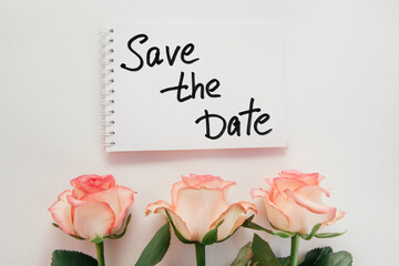 Save the date card with text and pink rose flowers bouquet on white background - Powered by Adobe