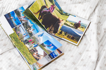 Fototapeta na wymiar My Family Travel Photobooks, open photo book