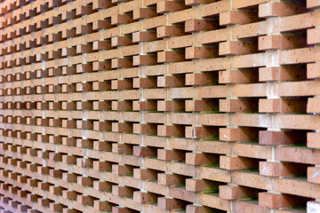 Vintage brick wall in lattice weave pattern background 