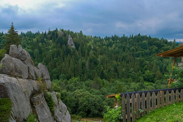 Carpathian forest and rocks on the site of the ancient fortress Tustan. archaeological and natural monument of Ukraine.