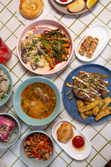 Top view of a table full of food in a cafe