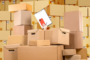 Stocktake at warehouse. Womans hand with clipboard. Chaos card boxes. Concept accounting courier...