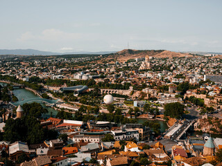 Aerial view on tiblisi and river Kura Mtkvari .Capital of Georgia. Tbilisi , Georgia 25.07.2022