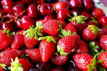 strawberries and cherries. healthy and delicious dessert.