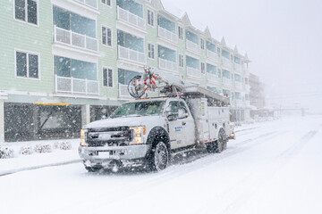 electric company truck in snow