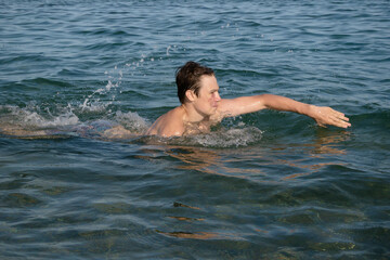 A 17 Year Old Teenage Boy Swiming