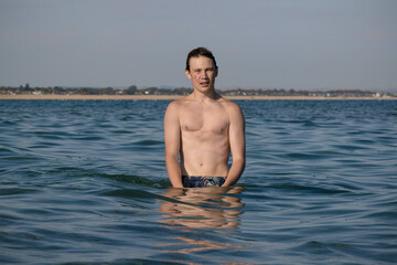 Fototapeta na wymiar A 17 Year Old Teenage Boy Swiming