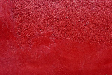 Rough colored wall background. Wall texture, smooth and bright. Solid red wall background