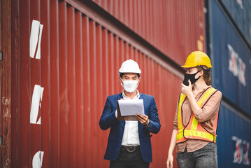 businessman person or engineer and foreman wearing safety helmet are talking about business manager job for logistic shipping transportation at cargo container yard, warehouse control industry work