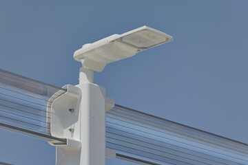 View towards the bridge through the industrial LED light