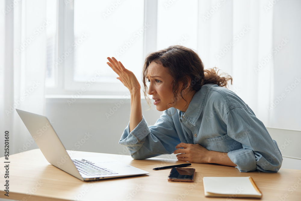 Aufkleber what is happened. confused unhappy beautiful curly woman office worker in perplexity raises hand up 