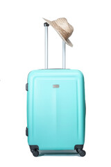 AQUAMARINE GREEN SUITCASE AND STRAW HAT ISOLATED ON WHITE BACKGROUND. VACATIONS, TRAVEL ALONE AND GETAWAYS CONCEPT.