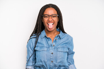black young adult woman feeling disgusted and irritated, sticking tongue out, disliking something...